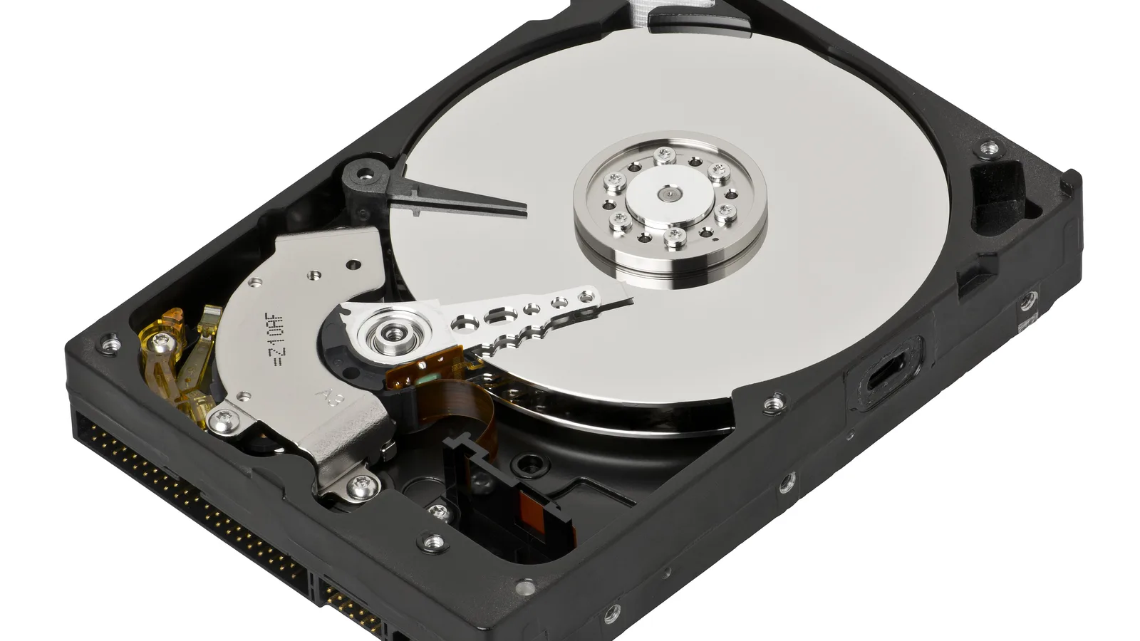 Opened 3.5-inch desktop hard disk drive showing the platter and read arm