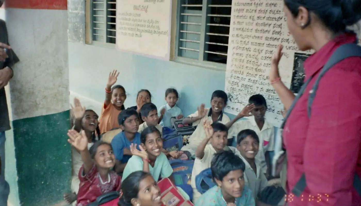 Students and staff using education software at an Indian institution